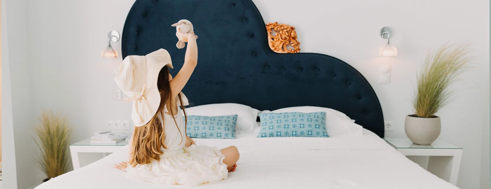 Bedroom with a navy heart shaped headboard